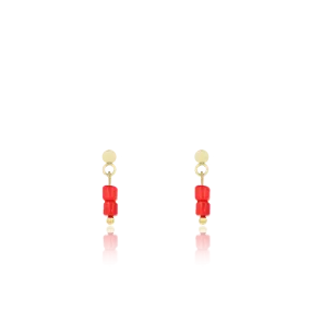 Gold coloured/red stud earrings with red beads